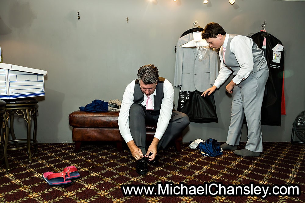 Groom getting ready tying shoes