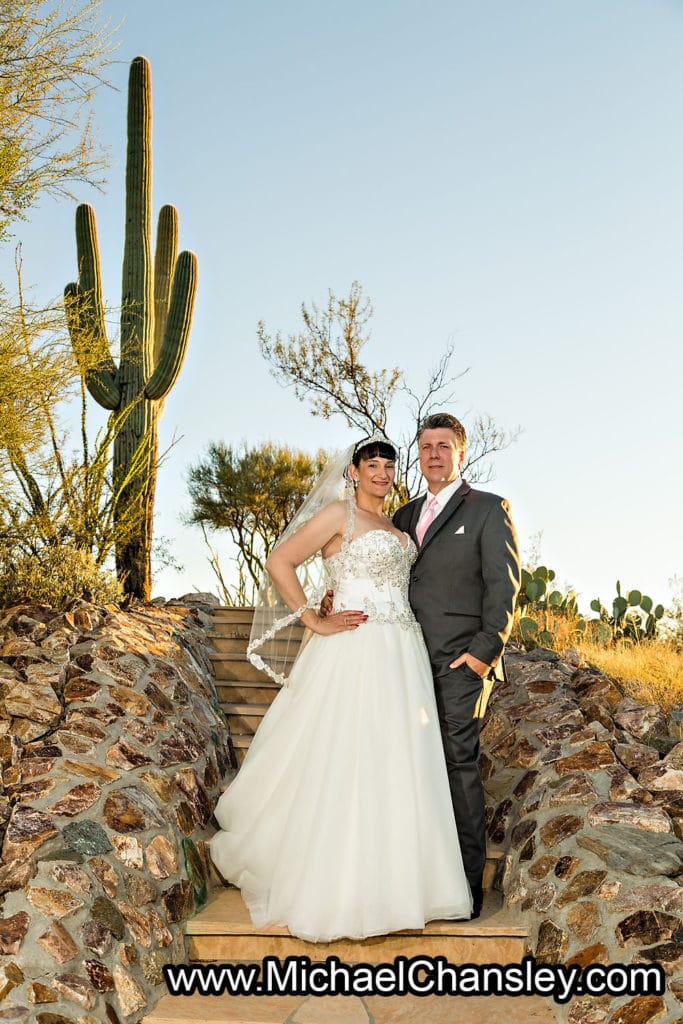 bride and groom with saguaro cactus