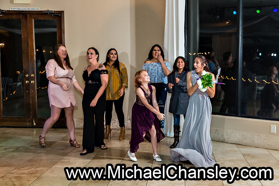 bouquets toss at Saguaro Buttes wedding